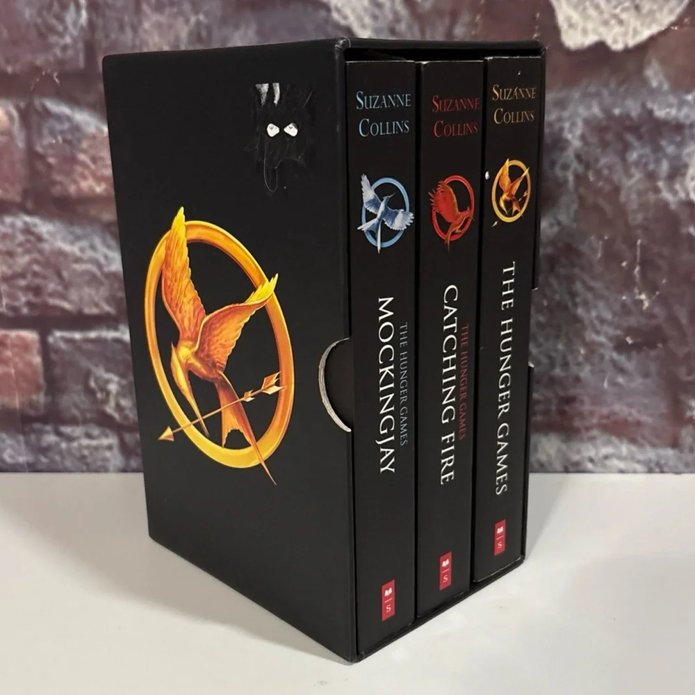 The Hunger Games Trilogy by Suzanne Collins  Paperback Box Set Of 3 Novels - Picture 2 of 16